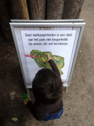 Max with a map at the DinoPark at the DierenPark Amersfoort zoo