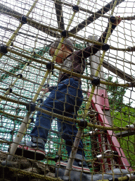 Max on a rope bridge at the playground near the Restaurant Buitenplaats at the DierenPark Amersfoort zoo