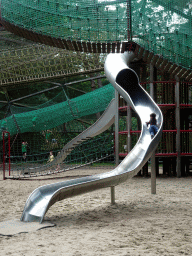 Max on a slide at the playground near the Restaurant Buitenplaats at the DierenPark Amersfoort zoo