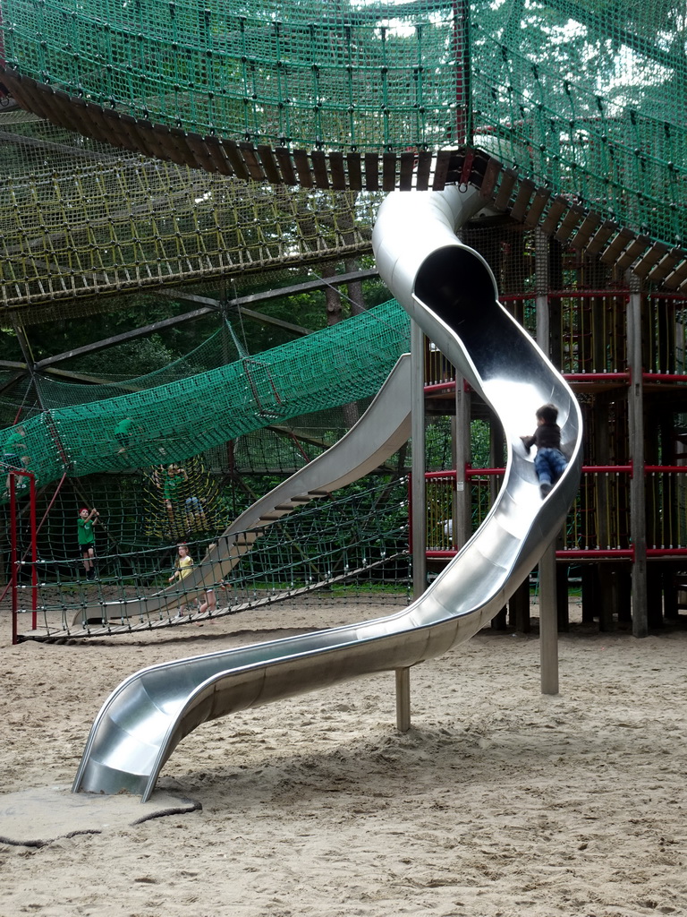 Max on a slide at the playground near the Restaurant Buitenplaats at the DierenPark Amersfoort zoo