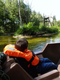 Max on the cycle boat on the Expedition River at the DierenPark Amersfoort zoo, with a view on the island with Golden-bellied Capuchins