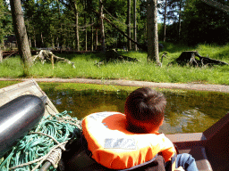 Max on the cycle boat on the Expedition River at the DierenPark Amersfoort zoo, with a view on the Ring-tailed Lemurs at the Monkey Island