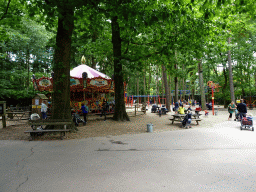 amersfoort_5_011 - 472 kb - 1024x768 - Carousel and playground at the Pretplein square at the DierenPark Amersfoort zoo Carousel and playground at the Pretplein square at the DierenPark Amersfoort zoo