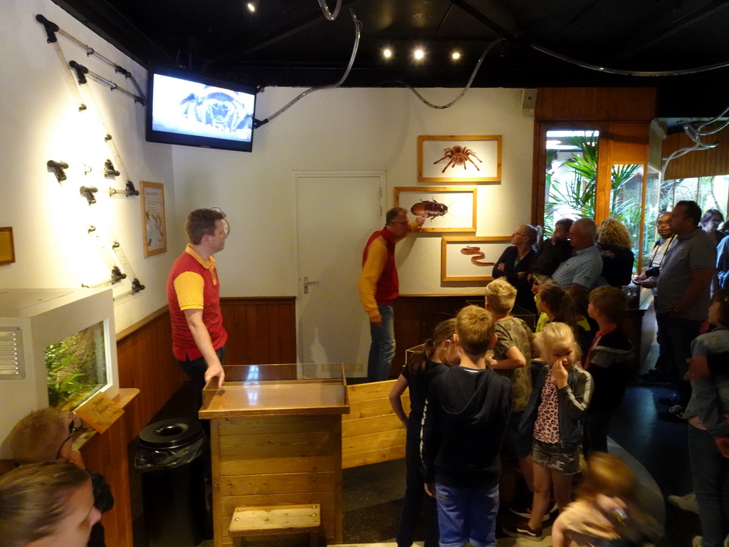 Zookeepers at the Honderdduizend Dierenhuis building at the DierenPark Amersfoort zoo