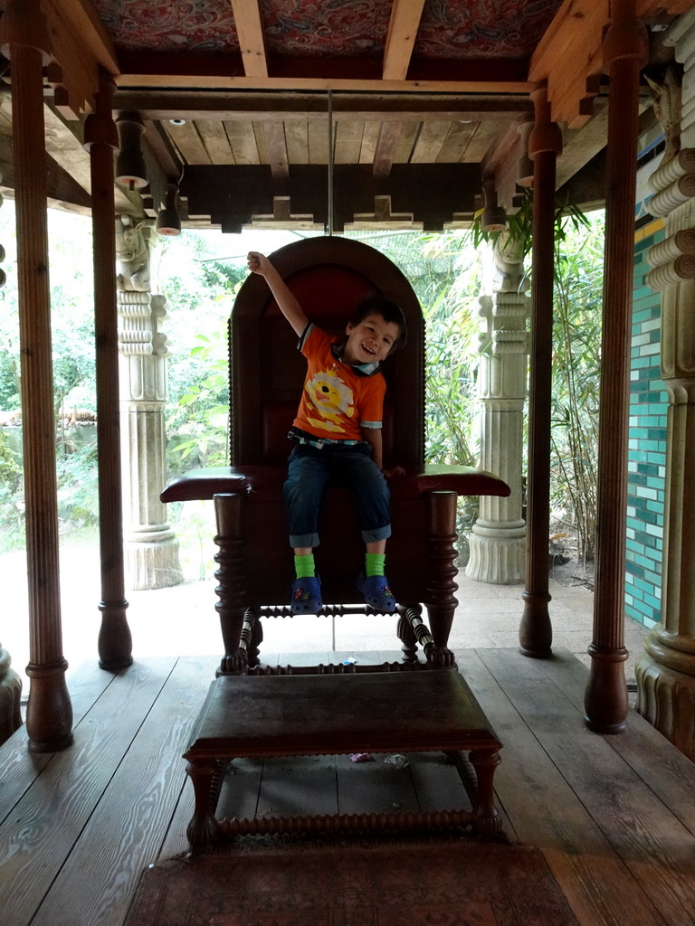 Max on the throne at the Palace of King Darius at the City of Antiquity at the DierenPark Amersfoort zoo