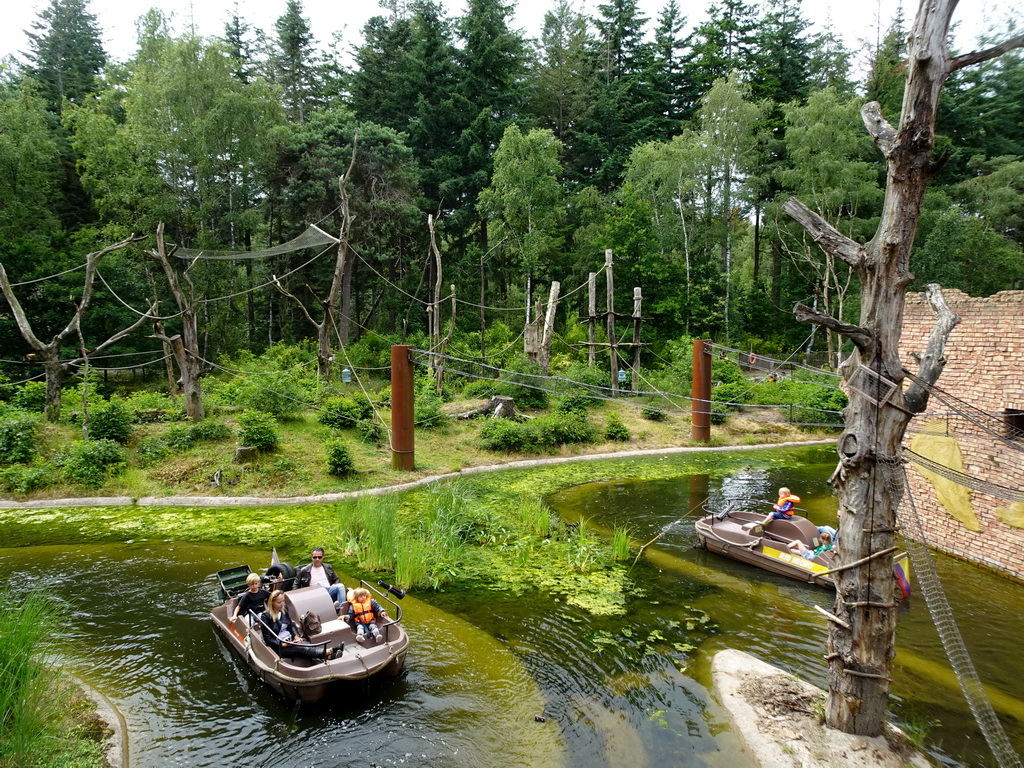 Cycle boats on the Expedition River and the island with Golden-bellied Capuchins at the DierenPark Amersfoort zoo, viewed from the bridge to the Monkey Island