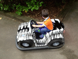 Max in a bumper car at the Pretplein square at the DierenPark Amersfoort zoo