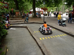 Max in a bumper car at the Pretplein square at the DierenPark Amersfoort zoo