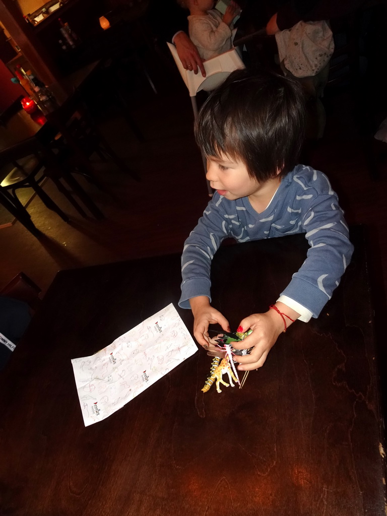 Max playing with animal toys at the Restaurant de Boerderij at the DierenPark Amersfoort zoo