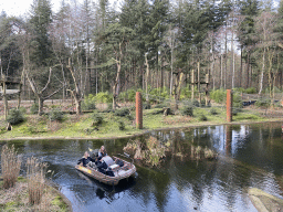 Cycle boats on the Expedition River and the island with Golden-bellied Capuchins at the DierenPark Amersfoort zoo, viewed from the bridge