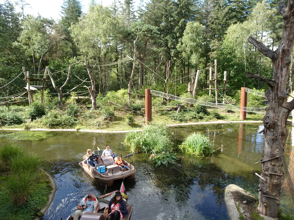 Cycle boats on the Expedition River and the island with Ring-tailed Lemurs at the DierenPark Amersfoort zoo, viewed from the Bailey Bridge