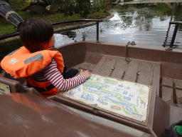 Max and a map on the cycle boat on the Expedition River at the DierenPark Amersfoort zoo