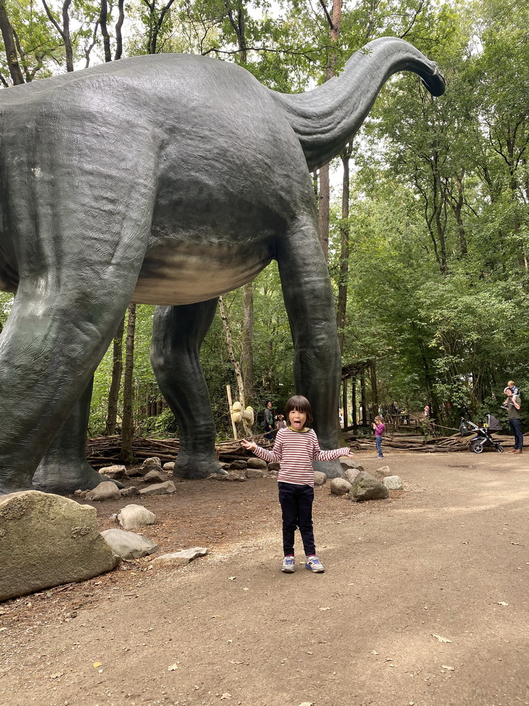Max with a Brachiosaurus statue at the DinoPark at the DierenPark Amersfoort zoo