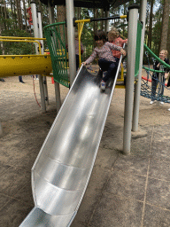 Max on a slide at the playground at the Pretplein square at the DierenPark Amersfoort zoo