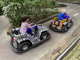 Max in a bumper car at the Pretplein square at the DierenPark Amersfoort zoo