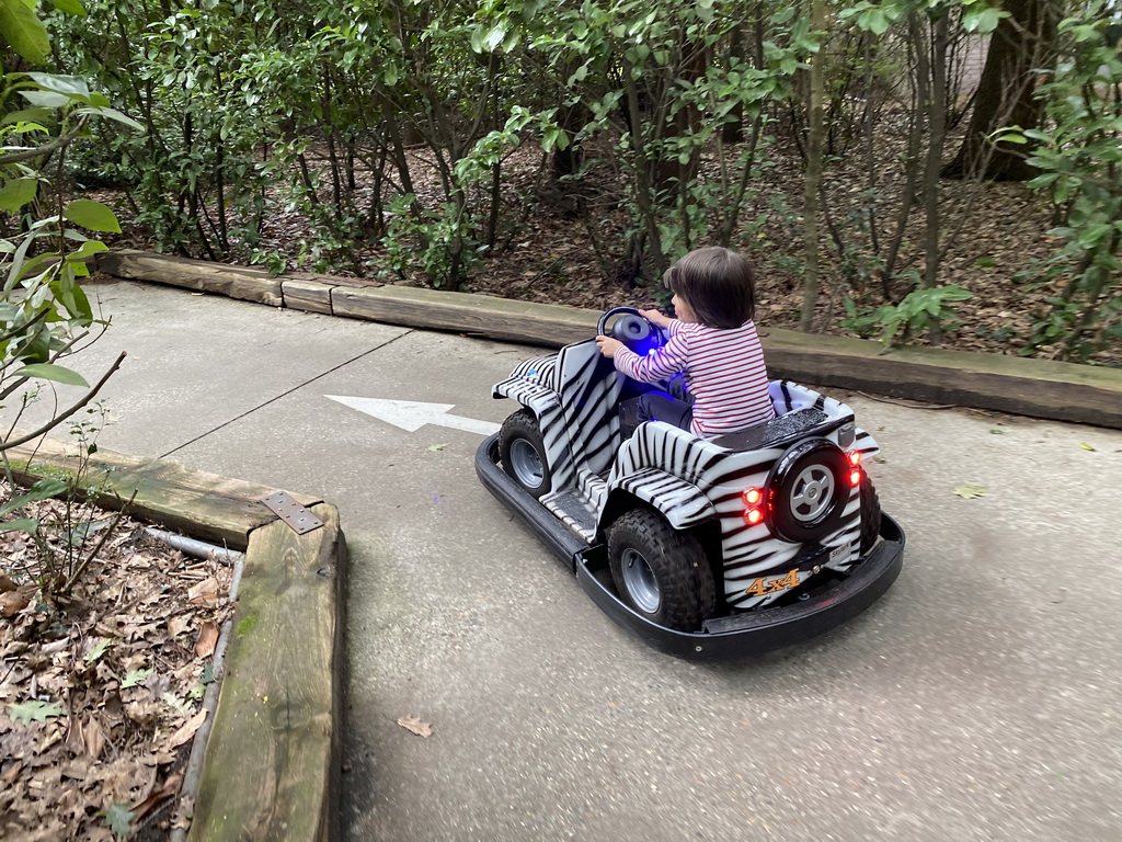 Max in a bumper car at the Pretplein square at the DierenPark Amersfoort zoo