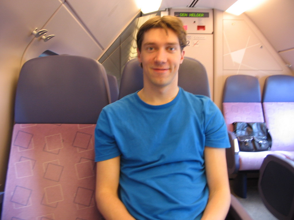 Tim in the train to Amsterdam