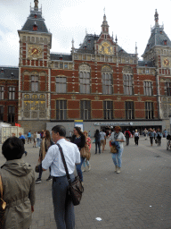 Miaomiao`s parents in front of the Amsterdam Central Railway Station at the Stationsplein square