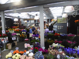 Flowers at a flower stall of the Bloemenmarkt at the Singel canal