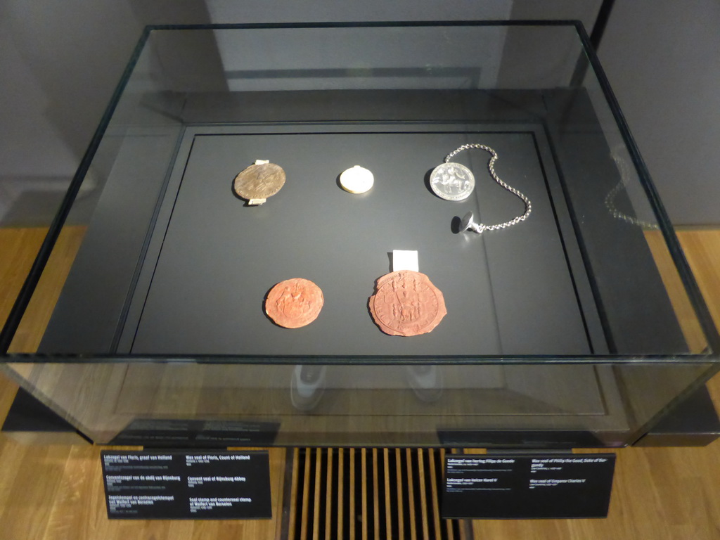 Wax seals at Room 0.4, with explanation, at the Ground Floor of the Rijksmuseum