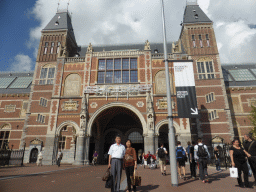 Miaomiao`s parents in front of the southwest side of the Rijksmuseum at the Museumplein square