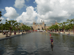 Pond in front of the `I amsterdam` text and the southwest side of the Rijksmuseum at the Museumplein square