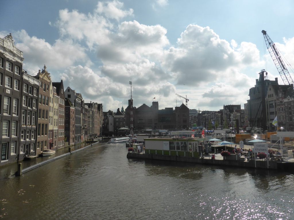 Boats in the Damrak canal and the northeast side of the Beurs van Berlage building, viewed from the Prins Hendrikkade street