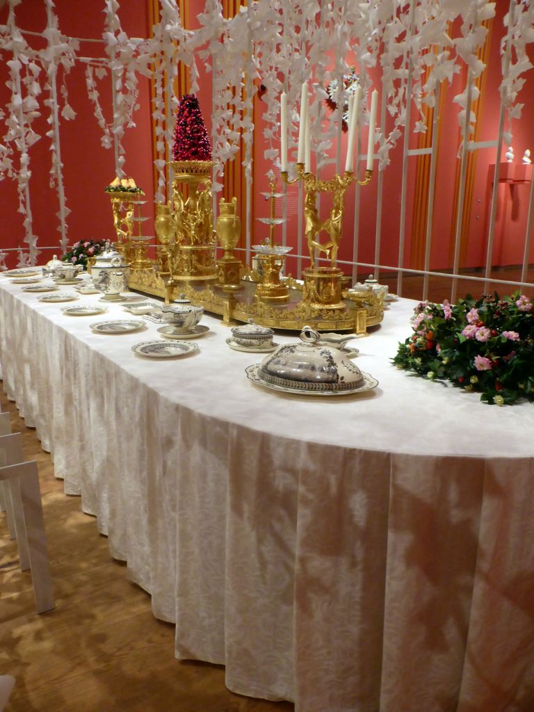 Items from the Green Frog Service at the exhibition `Dining with the Tsars` at the Main Hall at the First Floor of the Hermitage Amsterdam museum