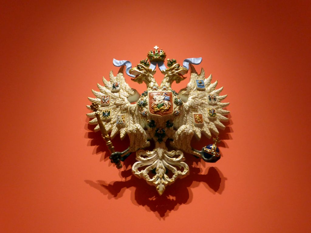 Porcelain double-headed eagle at the exhibition `Dining with the Tsars` at the Main Hall at the First Floor of the Hermitage Amsterdam museum