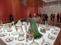 Miaomiao with items from the Berlin Dessert Service at the exhibition `Dining with the Tsars` at the Main Hall at the First Floor of the Hermitage Amsterdam museum