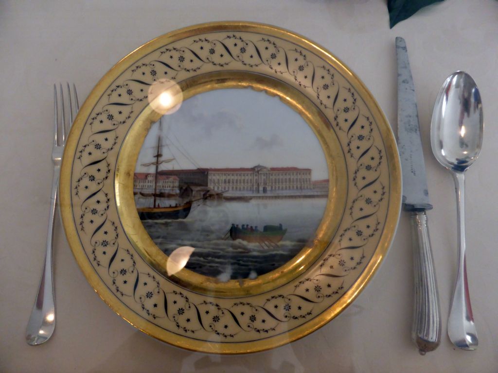One of the 20 plates from the Russian Service, with an image of the Winter Palace and the Neva river in St. Petersburg, at the exhibition `Dining with the Tsars` at the First Floor of the Hermitage Amsterdam museum