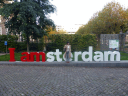 Miaomiao with the `I Amsterdam` sign at the Hoftuin garden