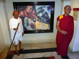Wax statues of Mahatma Gandhi and the Dalai Lama at the Madame Tussauds museum