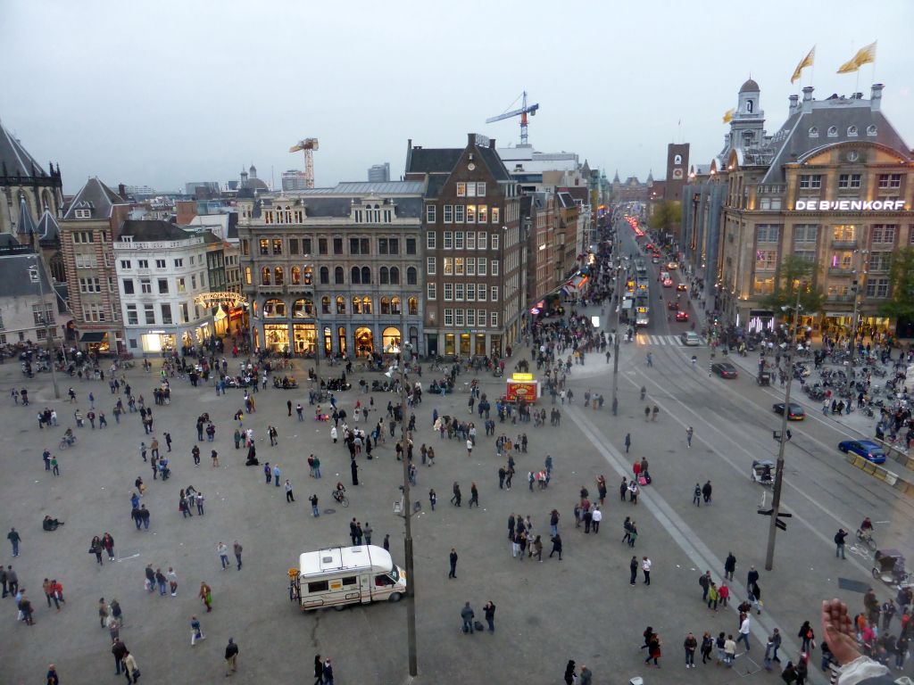 The Dam square with the Bijenkorf department store and the Damrak street, viewed from the top floor of the Madame Tussauds museum, at sunset