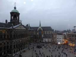 The Dam square with the Royal Palace Amsterdam and the Nieuwe Kerk church, viewed from the top floor of the Madame Tussauds museum, at sunset