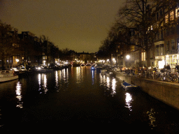 The Keizersgracht canal, viewed from the Leidsestraat street, by night