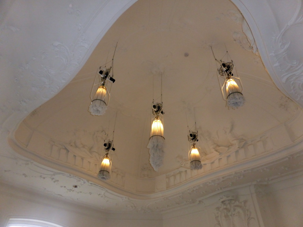 Lamps moving up and down at the ceiling of the staircase of the Philips Wing of the Rijksmuseum