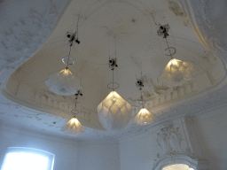 Lamps moving up and down at the ceiling of the staircase of the Philips Wing of the Rijksmuseum