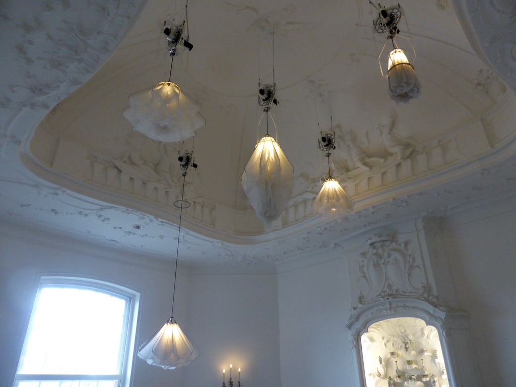 Lamps moving up and down at the ceiling of the staircase of the Philips Wing of the Rijksmuseum