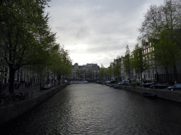 Boats in the Herengracht canal, viewed from the bridge at the Koningsplein square