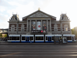 Front of the Royal Concertgebouw building and a tram at the Museumplein square