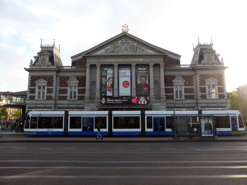 Front of the Royal Concertgebouw building and a tram at the Museumplein square
