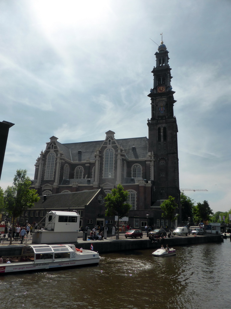 Boats in the Prinsengracht canal and the Westerkerk church