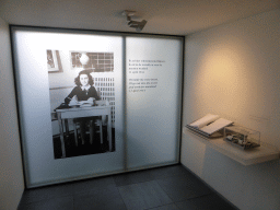 Photograph and quote of Anne Frank and the guestbook in the Anne Frank House museum at the Prinsengracht canal
