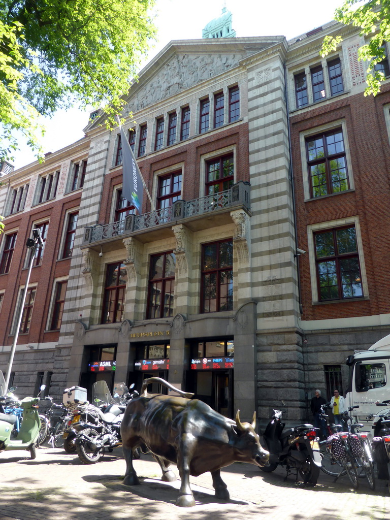 Bull statue in front of the Euronext stock market at the Beursplein square