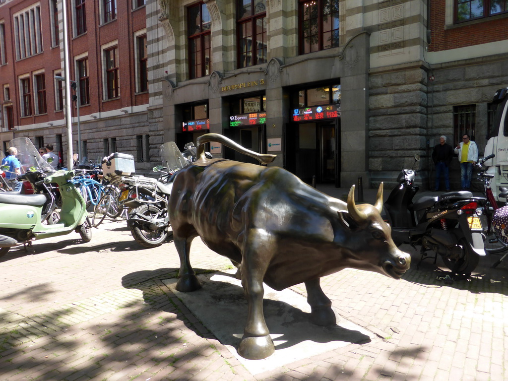 Bull statue in front of the Euronext stock market at the Beursplein square
