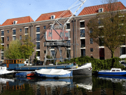 Houses and boats in the Entrepotdok canal, viewed from the Royal Artis Zoo