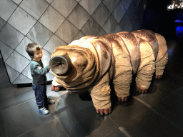 Max with a Tardigrade statue at the Upper Floor of the Micropia museum