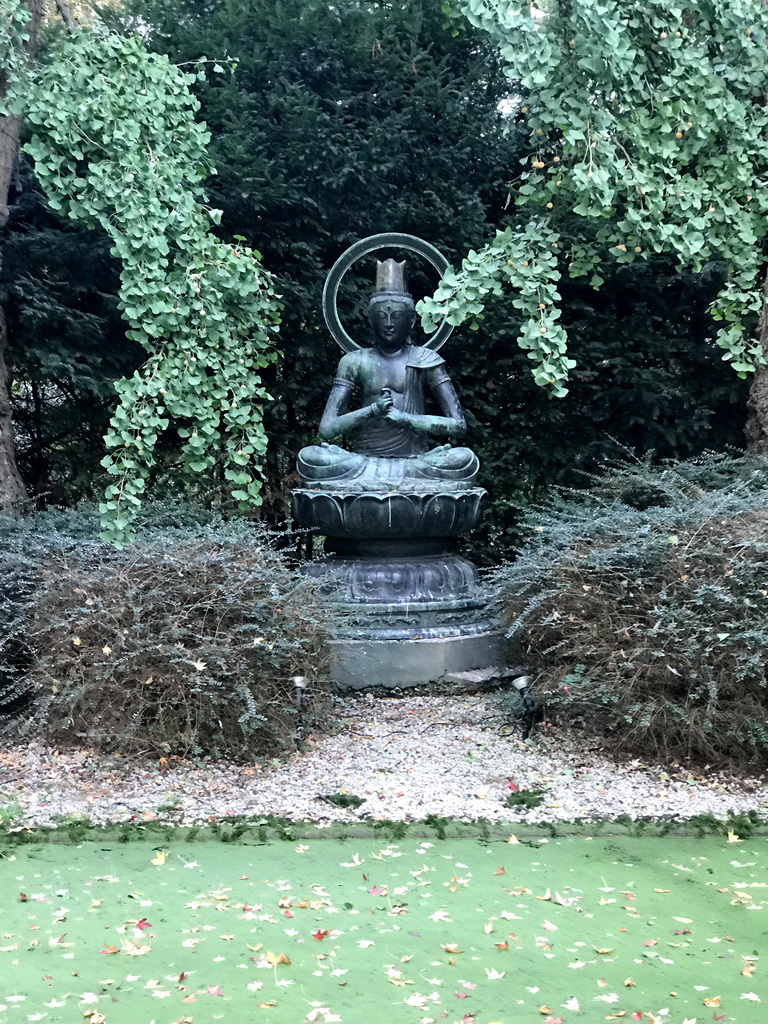 Buddha statue at the Japanse Paradijs Tuin garden at the Royal Artis Zoo