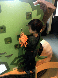 Max with a Crab toy at the Insectarium at the Royal Artis Zoo